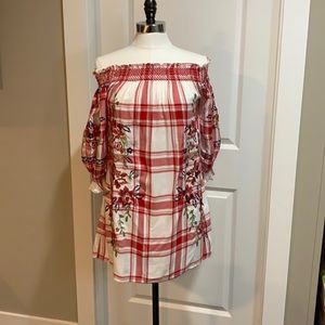 Zara women’s off the shoulder tunic.